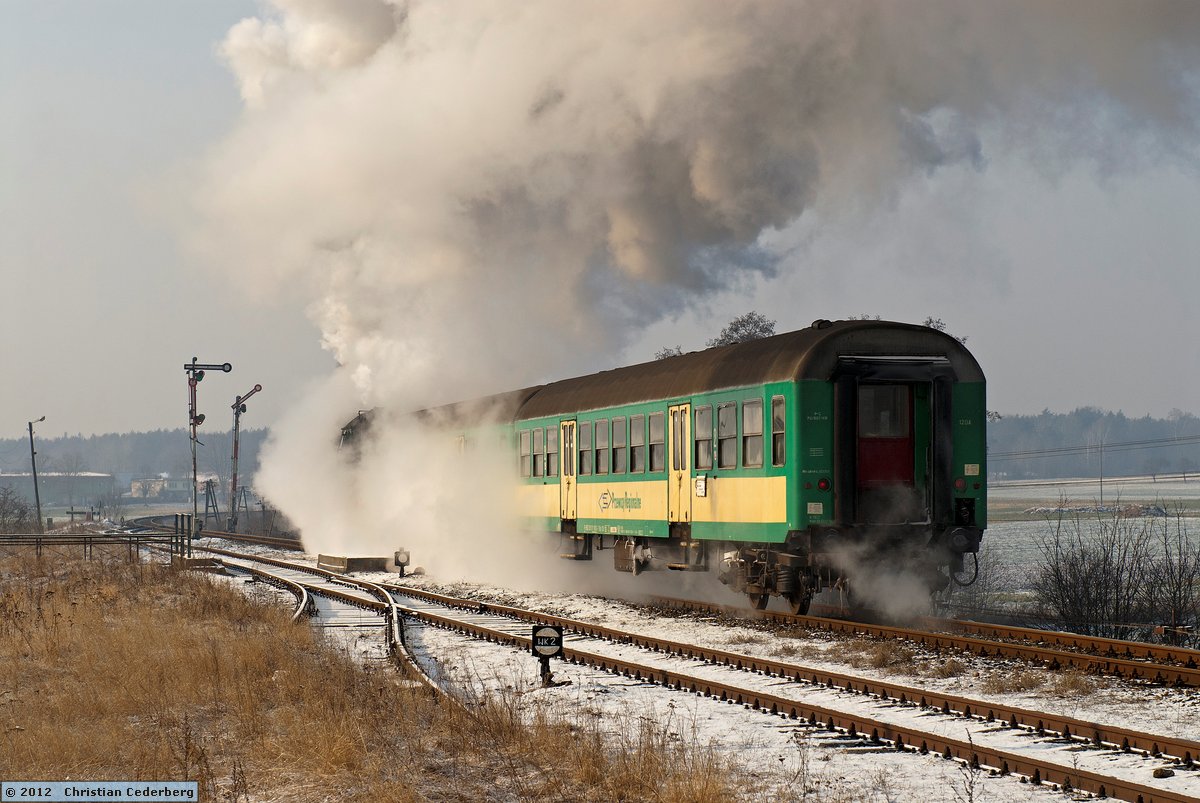 2012-02-05 11.04 Ol49-59 departing Rakoniewice with Wolsztyn-bound train.jpg