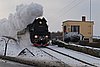 2012-02-09 14.09 Ol49-59 at level crossing no.58 with Poznan-bound train.jpg